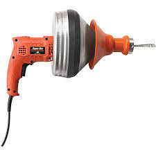 A black and decker electric drill with an orange handle.