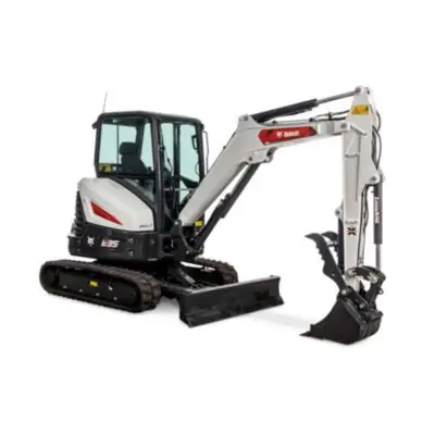 A white and black bobcat mini excavator with a bucket.