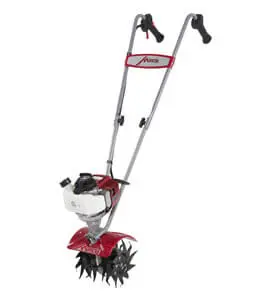 A red and silver cultivator is standing up