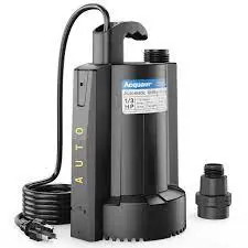 A black electric pump with its cord plugged in.