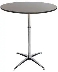 A table with a black top and chrome base.